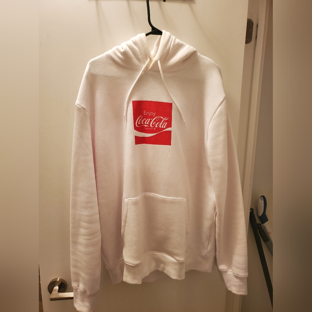 Coca a Cola with international logos on back  white/red size large hoodie